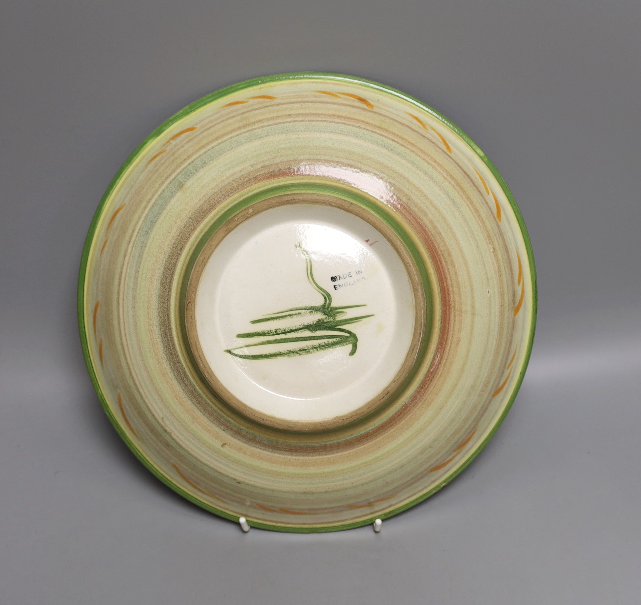 A painted studio pottery dish - 29cm diameter